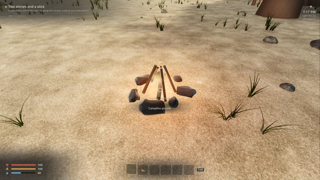A campfire placed on the sand